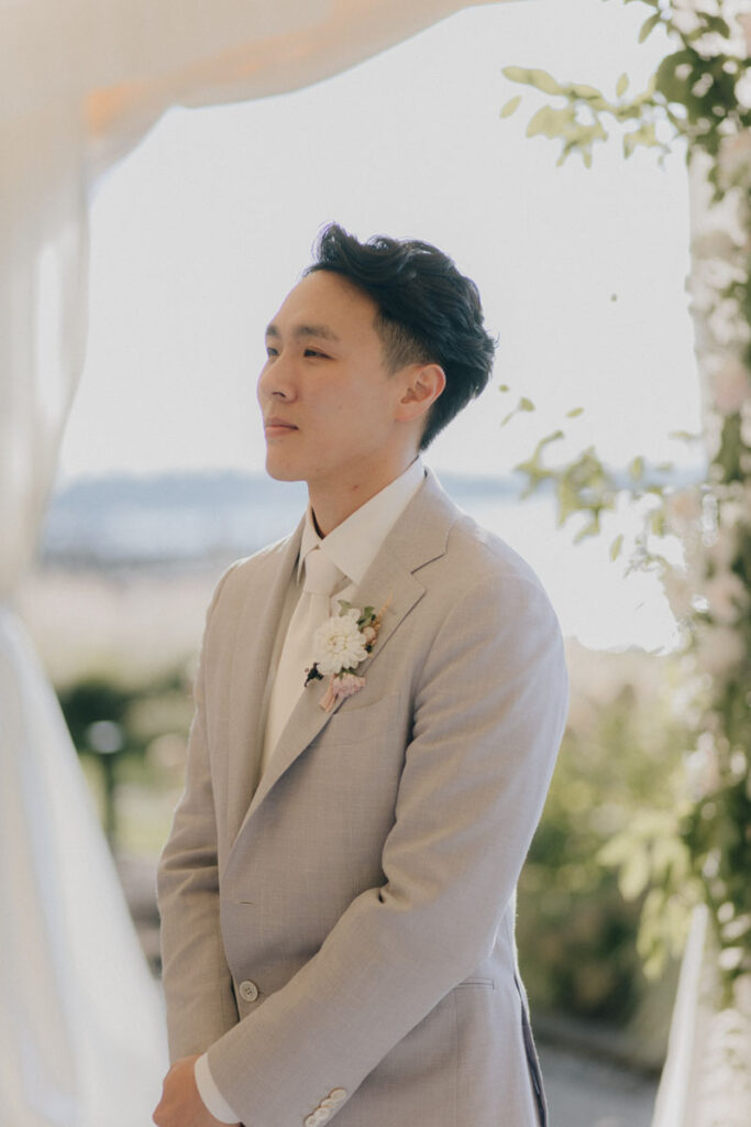 groom waiting for bride to walk down the aisle for ceremony